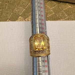 Elegant Gold Ring with Yellow Gemstone